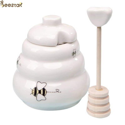 acheter Honey Jar Ceramic Honey Pot vide blanc en gros avec le plongeur en bois pour le stockage de miel fabrication en ligne
