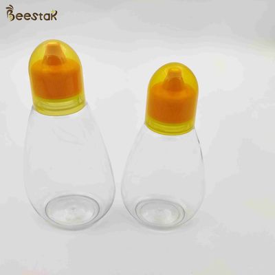 acheter 250ml 350ml 500ml Honey Jar And Spoon Plastic Honey Bottles vide pour le stockage de miel fabrication en ligne