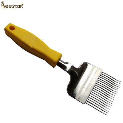 acheter La ruche jaune durable usine la fourchette d'acier inoxydable Honey Uncapping avec la poignée en plastique fabrication en ligne