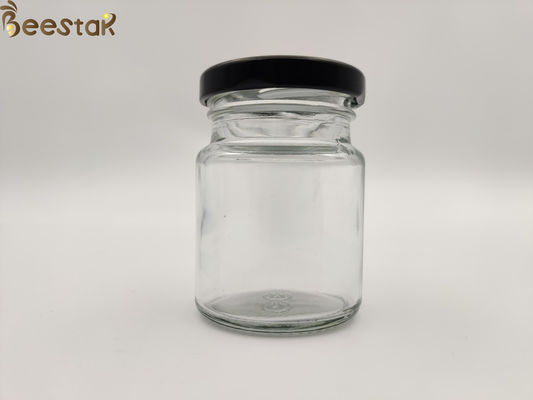 acheter bouteille de nid d'oiseau de 50ml 75ml autour de Honey Pot Glass Container Bottles de verre avec le couvercle noir fabrication en ligne