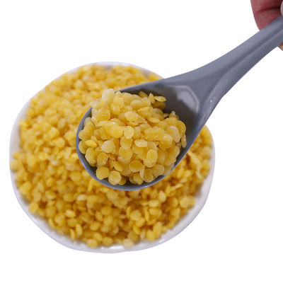 Granulés de cire d'abeille 100 % naturels purs, granulés jaunes ou blancs de qualité alimentaire.