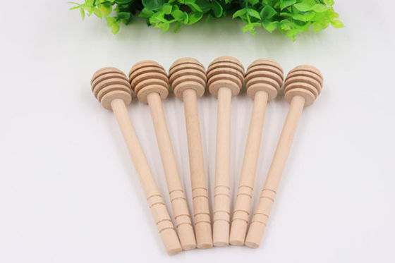 Barre en bois d'éclaboussure de miel de barre d'émoi de miel de longue poignée pour éclabousser le miel